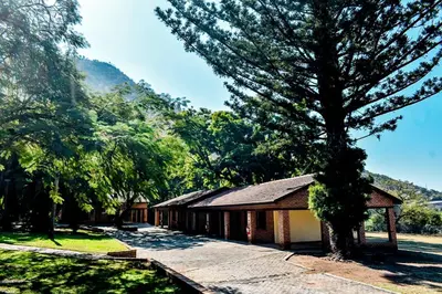 a building with a tree in front of it at Twin Bed Room in Steelpoort