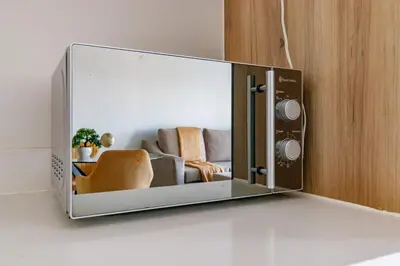 a glass box with a couch in a living room at Crystal Lagoon lifestyle holiday in Pretoria