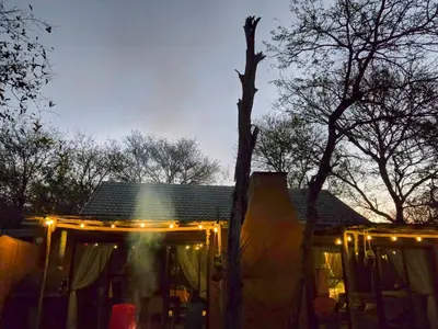 a house with lights on top of it at Home with Thelana in Marloth Park