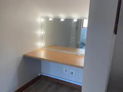 a small room with a counter with lights on it at Big 5 Cottage in Pretoria