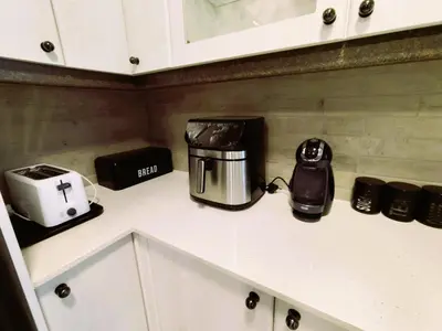 a kitchen counter with a toaster toaster and a blender at Letamo View - 5 bedroom house in Hartbeespoort