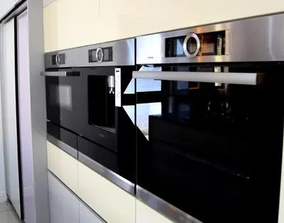 a kitchen with a black and silver oven at watershed Self catering in Phalaborwa