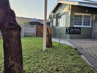 a house with a sign that reads on park at 5 On Park in Phalaborwa