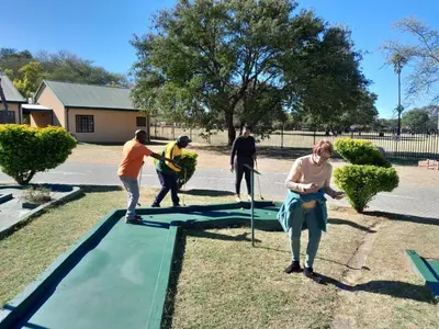 a group of people playing on a trampoline at 77 Pendleberry Grove in Warmbaths