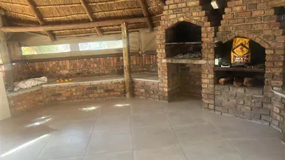a large brick room with a brick oven at VillaDelux in Pretoria