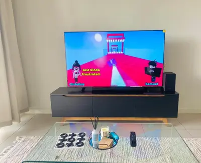 a tv screen with a video game on it at The Minimalist Hideout in Midrand