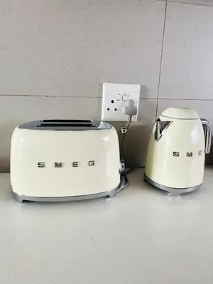two toasters sitting next to each other on a counter at The Minimalist Hideout in Midrand