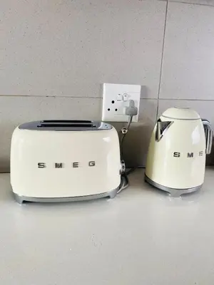 two toasters sitting next to each other on a counter at The Minimalist Hideout in Erand
