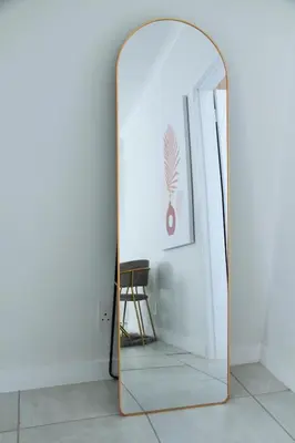 a mirror in the corner of a room at Modern 2BR Retreat at The Blyde in Pretoria