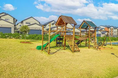 a park with a playground with a slide at 225 The Woods, Kyalami in Midrand