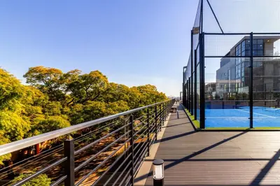 a bridge with a swimming pool on top of a building at The Manson's BishopsCourt in Pretoria