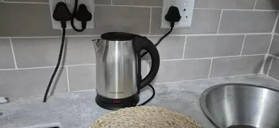 a coffee pot on a counter in a kitchen at Ekuhlaleni a home away from home R7 in Pretoria