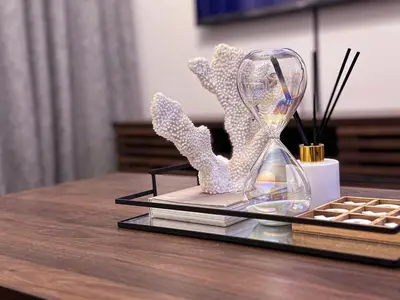 a glass trophy sitting on top of a table at A home away from home cosy luxurious compact 1 bed in Centurion