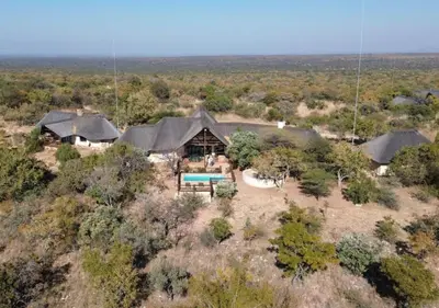 an aerial view of a house in the middle of a field at 205 Zebula, 4 bedroom house in Warmbaths