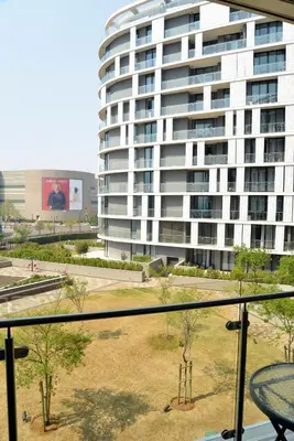 a view of a large building from a balcony at Luxury Escape at Ellipse 1-Bed, Kitchen, Wi-Fi & Free Parking in Midrand