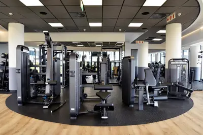 a gym with treadmills and weights at Luxury Escape at Ellipse 1-Bed, Kitchen, Wi-Fi & Free Parking in Midrand