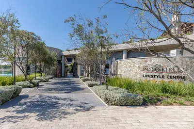 a building with a sign that reads rochelle turtle centre at AlimamaSpaces Semandi Polofields in Midrand