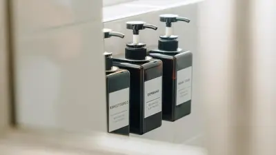 a row of three soap dispensers on a wall at Urban Gem on 18th Prime Location in Pretoria