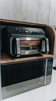 a toaster oven sitting on top of a microwave at Urban Gem on 18th Prime Location in Pretoria