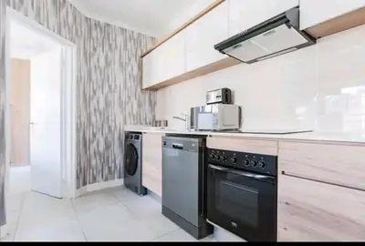 a kitchen with a stove and a dishwasher at AlimamaSpaces The Chelsea's Kikuyu in Midrand