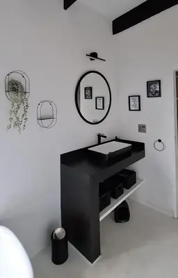 a bathroom with a black sink and a mirror at TheView Marloth Lodge in Marloth Park