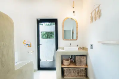 a bathroom with a sink and a mirror at TheView Marloth Lodge in Marloth Park