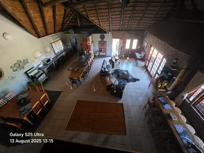 an overhead view of a living room with furniture at Veldjie Huis in Temba