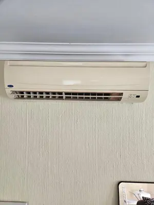 a air conditioner hanging from a ceiling at Bella Cottage in Centurion