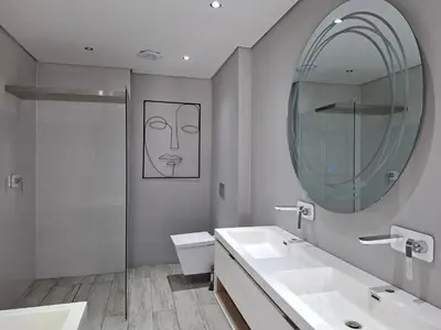 a bathroom with two sinks and a mirror at Apartment 1 at CView in Pretoria
