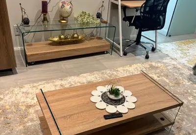 a coffee table in a living room with a glass table at Home at 422Trilogy Menlyn Maine in Pretoria