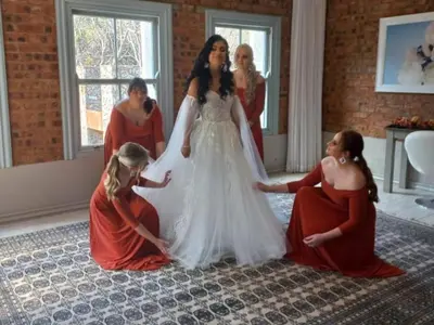 a group of women standing around a bride at La Serenita @ Migdash in Hartbeespoort
