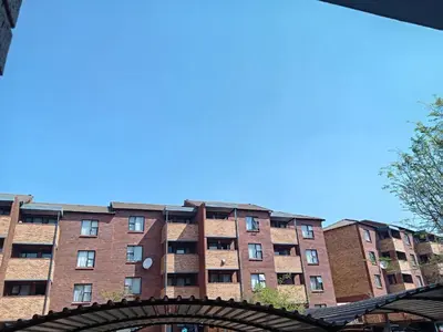 a large brick building in front at Pretoria east N4 rest and drive in Pretoria
