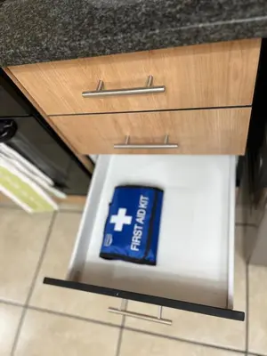 a drawer with a blue sign under a counter at Luxury Loft eMalahleni in Witbank