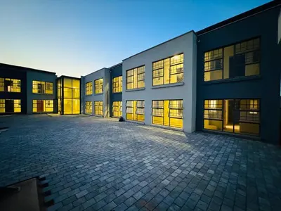 a large building with many windows on the side of it at Mhlahlo Guests in Ga-Rankuwa