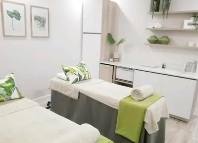 a hospital room with two beds and a sink at Blyde Lagoon in Pretoria