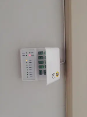 a remote control hanging on a wall at Entire Modern House!!- Middelburg in Middelburg