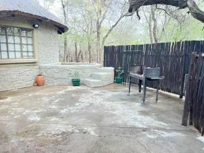 a patio with a piano in front of a house at Kettie&Klip Self Catering Accommodation in Marloth Park