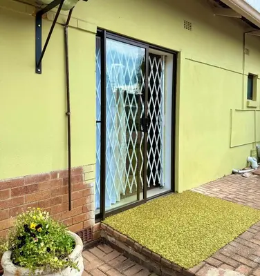 an open door of a building with a window at Cosy retreat for 2 at MeadWay in Benoni