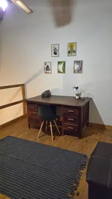 an office with a desk and a chair in a room at Dika Dika Den in Phalaborwa