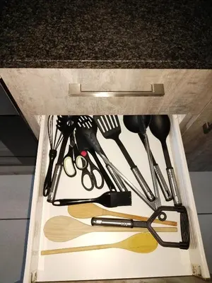 a drawer filled with lots of kitchen utensils at MamelaniQhibi Luxary Apartment in Nelspruit