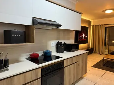 a kitchen with a stove and a counter top at The Dream Stay At The Blyde - Suite 2 in Pretoria