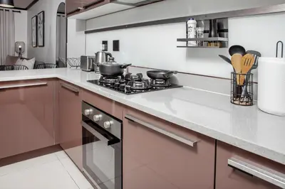 a kitchen with a stove and a counter top at Ever After Stays in Midrand