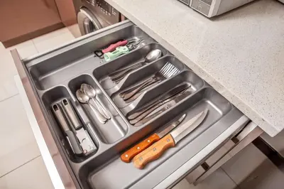 a drawer in a kitchen with utensils in it at Ever After Stays in Midrand