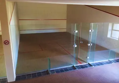 a bathroom with a glass shower in a room at Carlswald Luxe in Midrand