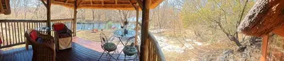 a view from the inside of a tree house with a balcony at Lethabo Estate in Lanseria