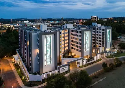 an overhead view of a large building in a city at Stay at Regency Luxe One in Pretoria