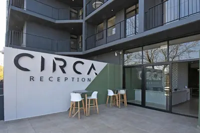 a building with a sign that readsctr reception at The 210 Circa Pretoria Studio in Pretoria