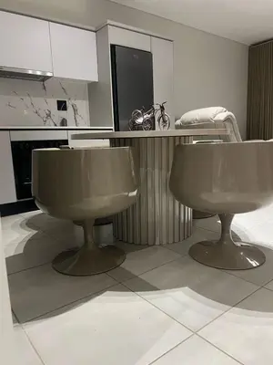 a bathroom with two urinals and a counter in a kitchen at The Blyde Crystal lagoon in Pretoria