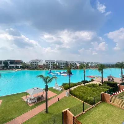 a view of a large pool at a resort at The Blyde Crystal lagoon in Pretoria