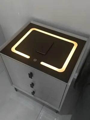a dresser with a light on top of it at The Airport Terminal Guesthouse in Kempton Park